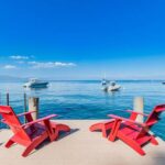 Homewood Pier with red chairs on Lake Tahoe